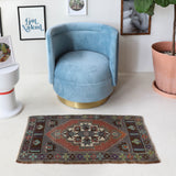 Vintage mini kilim rug in room decor setting, kilim, Turkish rug, vintage rug, portland, rug shop, bright colors, wild shaman, soft rug, bold color, Portland, Oregon, rug store, rug shop, local shop