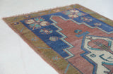 Vintage mini kilim rug in room decor setting, kilim, Turkish rug, vintage rug, portland, rug shop, bright colors, wild shaman, soft rug, bold color, Portland, Oregon, rug store, rug shop, local shop