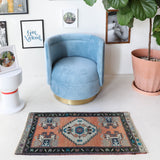 Vintage Turkish mini rug in room decor setting, old rug, antique rug, pastel colors, faded colors, Turkish rug, vintage rug, soft rug, Portland, Oregon, rug store, rug shop, local shop,  bright colors, bold colors