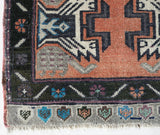 Vintage Turkish mini rug in room decor setting, old rug, antique rug, pastel colors, faded colors, Turkish rug, vintage rug, soft rug, Portland, Oregon, rug store, rug shop, local shop,  bright colors, bold colors