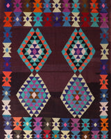 Vintage kilim rug in living room setting, old rug, antique rug, pastel colors, faded colors, Turkish rug, vintage rug, soft rug, Portland, Oregon, rug store, rug shop, local shop, earthy tones, earthy colors, warm colors