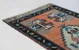 Vintage Turkish mini rug in room decor setting, old rug, antique rug, pastel colors, faded colors, Turkish rug, vintage rug, soft rug, Portland, Oregon, rug store, rug shop, local shop,  bright colors, bold colors