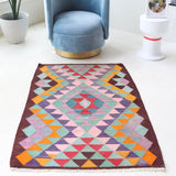 Vintage mini kilim rug in room decor setting, kilim, Turkish rug, vintage rug, portland, rug shop, bright colors, wild shaman, soft rug, bold color, Portland, Oregon, rug store, rug shop, local shop