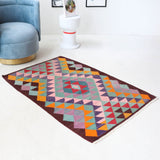 Vintage mini kilim rug in room decor setting, kilim, Turkish rug, vintage rug, portland, rug shop, bright colors, wild shaman, soft rug, bold color, Portland, Oregon, rug store, rug shop, local shop