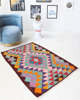 Vintage mini kilim rug in room decor setting, kilim, Turkish rug, vintage rug, portland, rug shop, bright colors, wild shaman, soft rug, bold color, Portland, Oregon, rug store, rug shop, local shop