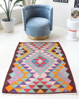 Vintage mini kilim rug in room decor setting, kilim, Turkish rug, vintage rug, portland, rug shop, bright colors, wild shaman, soft rug, bold color, Portland, Oregon, rug store, rug shop, local shop