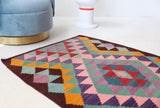 Vintage mini kilim rug in room decor setting, kilim, Turkish rug, vintage rug, portland, rug shop, bright colors, wild shaman, soft rug, bold color, Portland, Oregon, rug store, rug shop, local shop