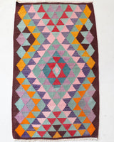 Vintage mini kilim rug in room decor setting, kilim, Turkish rug, vintage rug, portland, rug shop, bright colors, wild shaman, soft rug, bold color, Portland, Oregon, rug store, rug shop, local shop