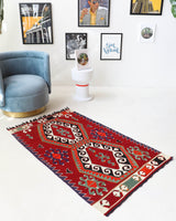Vintage mini kilim rug in room decor setting, kilim, Turkish rug, vintage rug, portland, rug shop, bright colors, wild shaman, soft rug, bold color, Portland, Oregon, rug store, rug shop, local shop