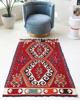 Vintage mini kilim rug in room decor setting, kilim, Turkish rug, vintage rug, portland, rug shop, bright colors, wild shaman, soft rug, bold color, Portland, Oregon, rug store, rug shop, local shop