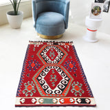Vintage mini kilim rug in room decor setting, kilim, Turkish rug, vintage rug, portland, rug shop, bright colors, wild shaman, soft rug, bold color, Portland, Oregon, rug store, rug shop, local shop