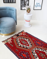 Vintage mini kilim rug in room decor setting, kilim, Turkish rug, vintage rug, portland, rug shop, bright colors, wild shaman, soft rug, bold color, Portland, Oregon, rug store, rug shop, local shop