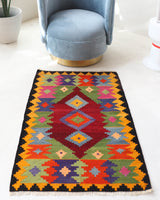Vintage mini kilim rug in room decor setting, kilim, Turkish rug, vintage rug, portland, rug shop, bright colors, wild shaman, soft rug, bold color, Portland, Oregon, rug store, rug shop, local shop