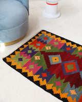 Vintage mini kilim rug in room decor setting, kilim, Turkish rug, vintage rug, portland, rug shop, bright colors, wild shaman, soft rug, bold color, Portland, Oregon, rug store, rug shop, local shop