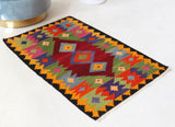Vintage mini kilim rug in room decor setting, kilim, Turkish rug, vintage rug, portland, rug shop, bright colors, wild shaman, soft rug, bold color, Portland, Oregon, rug store, rug shop, local shop