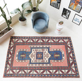 Vintage Turkish rug in a living room setting, Area rug in a living room setting, pile rug, Turkish rug, old rug, antique rug, pastel colors, faded colors, Turkish rug, vintage rug, soft rug, Portland, Oregon, rug store, rug shop, local shop, distressed rug, worn out rug