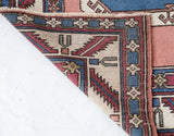 Vintage Turkish rug in a living room setting, Area rug in a living room setting, pile rug, Turkish rug, old rug, antique rug, pastel colors, faded colors, Turkish rug, vintage rug, soft rug, Portland, Oregon, rug store, rug shop, local shop, distressed rug, worn out rug