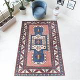 Vintage Turkish rug in a living room setting, Area rug in a living room setting, pile rug, Turkish rug, old rug, antique rug, pastel colors, faded colors, Turkish rug, vintage rug, soft rug, Portland, Oregon, rug store, rug shop, local shop, distressed rug, worn out rug
