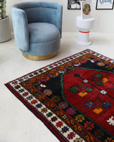 Vintage Turkish rug in a living room setting, pile rug, Turkish rug, vintage rug, portland, rug shop, bright colors, wild shaman, soft rug, bold color, Portland, Oregon, rug store, rug shop, local shop, shag rug, shaggy, plush,tulu rugs