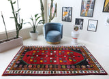 Vintage Turkish rug in a living room setting, pile rug, Turkish rug, vintage rug, portland, rug shop, bright colors, wild shaman, soft rug, bold color, Portland, Oregon, rug store, rug shop, local shop, shag rug, shaggy, plush,tulu rugs
