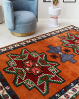 Vintage Turkish rug in a living room setting, pile rug, Turkish rug, vintage rug, portland, rug shop, bright colors, wild shaman, soft rug, bold color, Portland, Oregon, rug store, rug shop, local shop, shag rug, shaggy, plush,tulu rugs