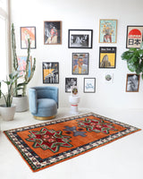 Vintage Turkish rug in a living room setting, pile rug, Turkish rug, vintage rug, portland, rug shop, bright colors, wild shaman, soft rug, bold color, Portland, Oregon, rug store, rug shop, local shop, shag rug, shaggy, plush,tulu rugs