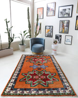 Vintage Turkish rug in a living room setting, pile rug, Turkish rug, vintage rug, portland, rug shop, bright colors, wild shaman, soft rug, bold color, Portland, Oregon, rug store, rug shop, local shop, shag rug, shaggy, plush,tulu rugs