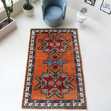 Vintage Turkish rug in a living room setting, pile rug, Turkish rug, vintage rug, portland, rug shop, bright colors, wild shaman, soft rug, bold color, Portland, Oregon, rug store, rug shop, local shop, shag rug, shaggy, plush,tulu rugs