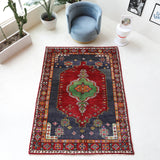 Vintage Turkish rug in a living room setting, pile rug, Turkish rug, vintage rug, portland, rug shop, bright colors, wild shaman, soft rug, bold color, Portland, Oregon, rug store, rug shop, local shop, shag rug, shaggy, plush,tulu rugs