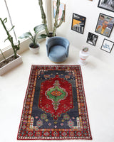 Vintage Turkish rug in a living room setting, pile rug, Turkish rug, vintage rug, portland, rug shop, bright colors, wild shaman, soft rug, bold color, Portland, Oregon, rug store, rug shop, local shop, shag rug, shaggy, plush,tulu rugs