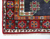 Vintage Turkish rug in a living room setting, pile rug, Turkish rug, vintage rug, portland, rug shop, bright colors, wild shaman, soft rug, bold color, Portland, Oregon, rug store, rug shop, local shop, shag rug, shaggy, plush,tulu rugs