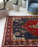 Vintage Turkish rug in a living room setting, pile rug, Turkish rug, vintage rug, portland, rug shop, bright colors, wild shaman, soft rug, bold color, Portland, Oregon, rug store, rug shop, local shop, shag rug, shaggy, plush,tulu rugs
