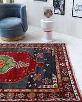 Vintage Turkish rug in a living room setting, pile rug, Turkish rug, vintage rug, portland, rug shop, bright colors, wild shaman, soft rug, bold color, Portland, Oregon, rug store, rug shop, local shop, shag rug, shaggy, plush,tulu rugs