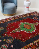 Vintage Turkish rug in a living room setting, pile rug, Turkish rug, vintage rug, portland, rug shop, bright colors, wild shaman, soft rug, bold color, Portland, Oregon, rug store, rug shop, local shop, shag rug, shaggy, plush,tulu rugs