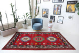 Vintage Turkish rug in a living room setting, pile rug, Turkish rug, vintage rug, portland, rug shop, bright colors, wild shaman, soft rug, bold color, Portland, Oregon, rug store, rug shop, local shop, shag rug, shaggy, plush,tulu rugs