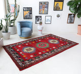 Vintage Turkish rug in a living room setting, pile rug, Turkish rug, vintage rug, portland, rug shop, bright colors, wild shaman, soft rug, bold color, Portland, Oregon, rug store, rug shop, local shop, shag rug, shaggy, plush,tulu rugs