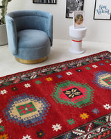 Vintage Turkish rug in a living room setting, pile rug, Turkish rug, vintage rug, portland, rug shop, bright colors, wild shaman, soft rug, bold color, Portland, Oregon, rug store, rug shop, local shop, shag rug, shaggy, plush,tulu rugs