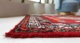 Vintage Turkish rug in a living room setting, pile rug, Turkish rug, vintage rug, portland, rug shop, bright colors, wild shaman, soft rug, bold color, Portland, Oregon, rug store, rug shop, local shop, shag rug, shaggy, plush,tulu rugs