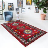 Vintage Turkish rug in a living room setting, pile rug, Turkish rug, vintage rug, portland, rug shop, bright colors, wild shaman, soft rug, bold color, Portland, Oregon, rug store, rug shop, local shop, shag rug, shaggy, plush,tulu rugs