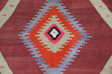 Vintage Turkish rug in a living room setting, pile rug, Turkish rug, vintage rug, portland, rug shop, bright colors, wild shaman, soft rug, bold color, Portland, Oregon, rug store, rug shop, local shop, antique rug