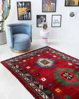 Vintage Turkish rug in a living room setting, pile rug, Turkish rug, vintage rug, portland, rug shop, bright colors, wild shaman, soft rug, bold color, Portland, Oregon, rug store, rug shop, local shop, shag rug, shaggy, plush,tulu rugs