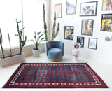 Vintage Turkish rug in a living room setting, pile rug, Turkish rug, vintage rug, portland, rug shop, bright colors, wild shaman, soft rug, bold color, Portland, Oregon, rug store, rug shop, local shop, antique rug