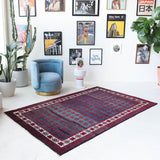 Vintage Turkish rug in a living room setting, pile rug, Turkish rug, vintage rug, portland, rug shop, bright colors, wild shaman, soft rug, bold color, Portland, Oregon, rug store, rug shop, local shop, antique rug