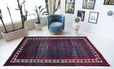 Vintage Turkish rug in a living room setting, pile rug, Turkish rug, vintage rug, portland, rug shop, bright colors, wild shaman, soft rug, bold color, Portland, Oregon, rug store, rug shop, local shop, antique rug