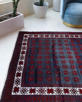 Vintage Turkish rug in a living room setting, pile rug, Turkish rug, vintage rug, portland, rug shop, bright colors, wild shaman, soft rug, bold color, Portland, Oregon, rug store, rug shop, local shop, antique rug