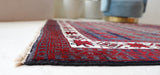 Vintage Turkish rug in a living room setting, pile rug, Turkish rug, vintage rug, portland, rug shop, bright colors, wild shaman, soft rug, bold color, Portland, Oregon, rug store, rug shop, local shop, antique rug