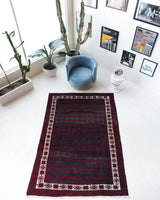 Vintage Turkish rug in a living room setting, pile rug, Turkish rug, vintage rug, portland, rug shop, bright colors, wild shaman, soft rug, bold color, Portland, Oregon, rug store, rug shop, local shop, antique rug