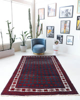 Vintage Turkish rug in a living room setting, pile rug, Turkish rug, vintage rug, portland, rug shop, bright colors, wild shaman, soft rug, bold color, Portland, Oregon, rug store, rug shop, local shop, antique rug
