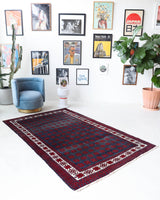 Vintage Turkish rug in a living room setting, pile rug, Turkish rug, vintage rug, portland, rug shop, bright colors, wild shaman, soft rug, bold color, Portland, Oregon, rug store, rug shop, local shop, antique rug