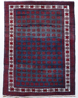 Vintage Turkish rug in a living room setting, pile rug, Turkish rug, vintage rug, portland, rug shop, bright colors, wild shaman, soft rug, bold color, Portland, Oregon, rug store, rug shop, local shop, antique rug